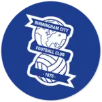A Birmingham City club crest on a dark blue circle