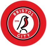 A Bristol City club crest on a red circle