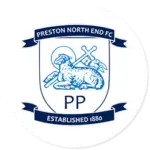 A Preston North End club crest on a white circle