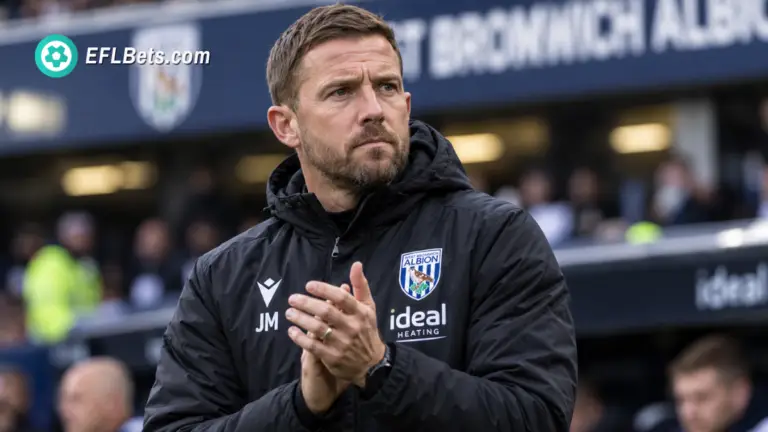 West Bromwich Albion manager James Morrison standing pitch-side