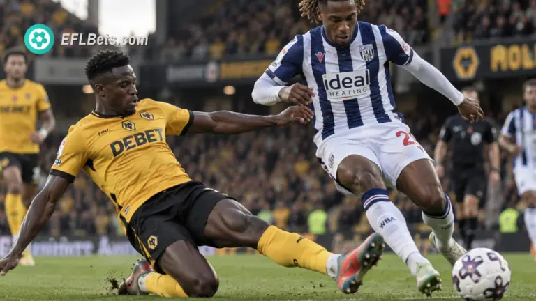 Munetsi of Wolves, sliding into a ferocius tackle with Nzingoula of West Brom