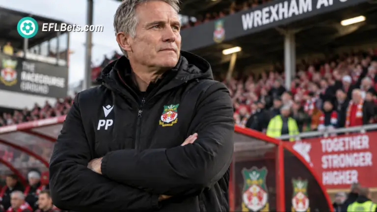Wrexham manager Phil Parkinson standing pitch-side