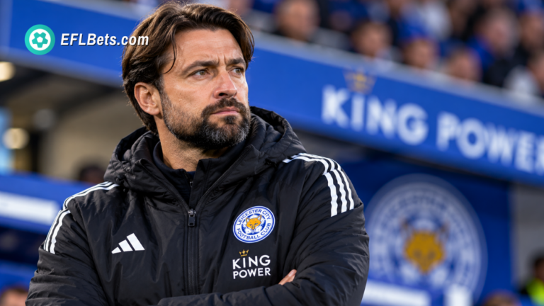 Leicester City manager Russell Martin standing pitch-side