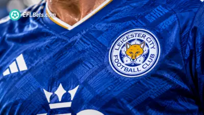 Close up of a Leicester City club badge on a player's shirt
