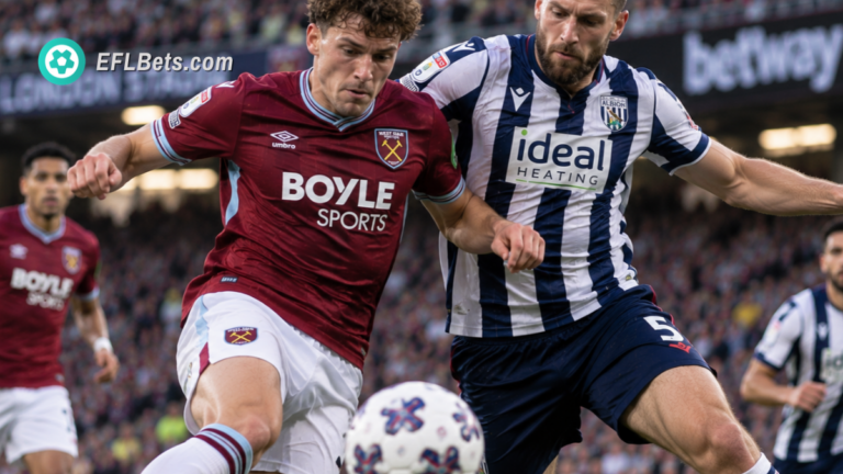 Arne Engels of West Ham, competing for the ball with Nathaniel Phillips of West Brom in a packed London Stadium